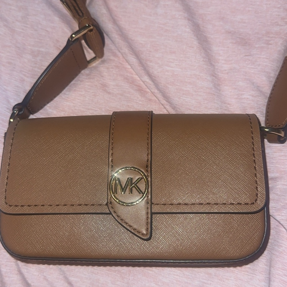 Michael Kors Greenwich extra small Saffiano leather sling crossbody bag.